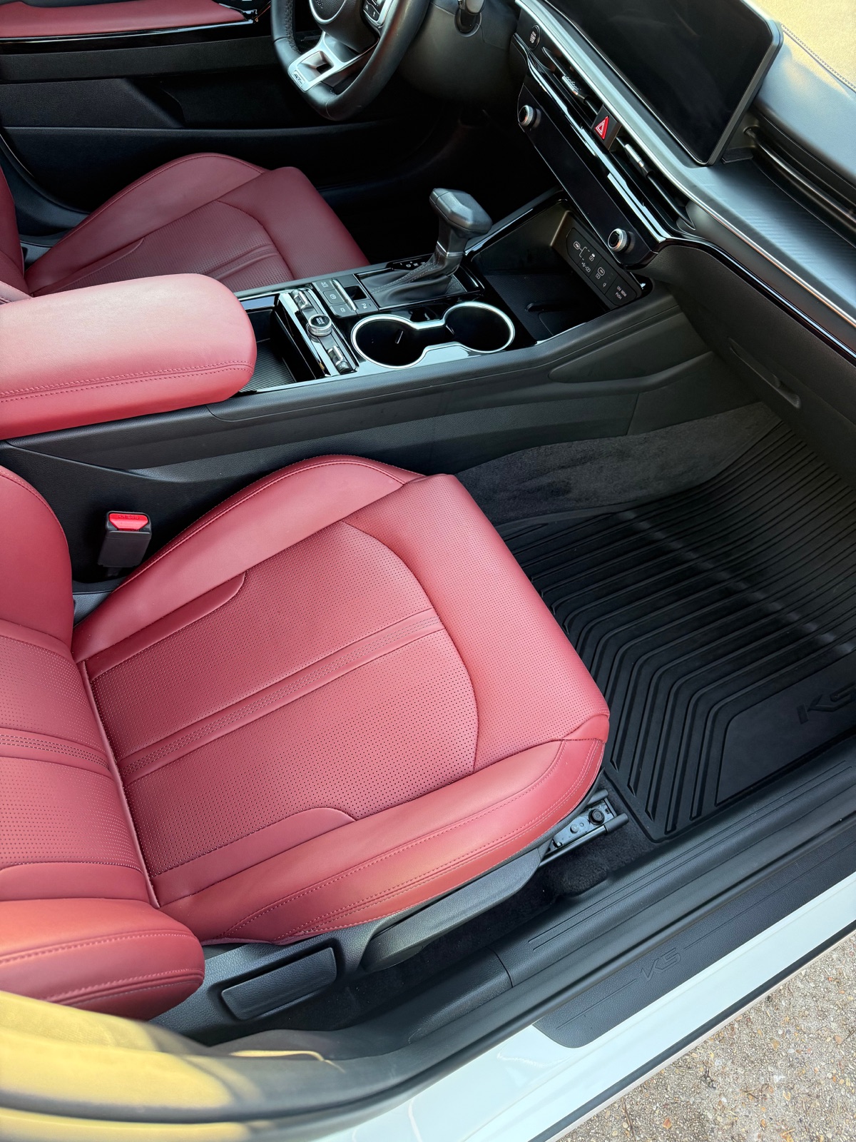 Detailed Kia K5 with red leather seats and cleaned cabin